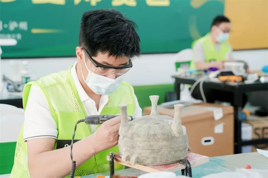 湖北省文物考古研究院周明比賽中。